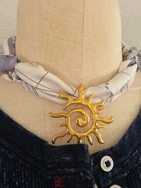 Dior Gold Sun Pendant Scarf Necklace on Cream & Light Gray Scarf
